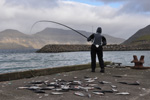 Marita fishing in Leirvík