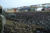 Fótbóltsvøllurin verður ruddaður fyri aðru ferð í 2008 / Oprydning af fodboldsbanen for anden gang i 2008 / Cleaning up the football ground for the second time in 2008.